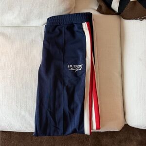 Sporty & Rich Navy Sweatpants with Red & White Side Stripes